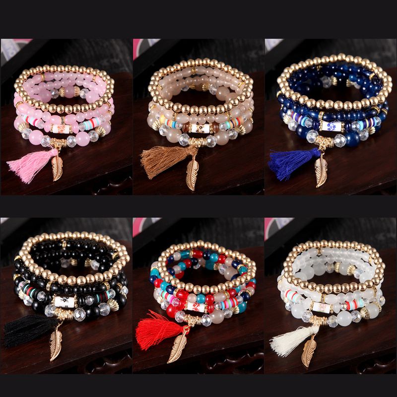 Bracciale con nappe e foglie, set di quattro pezzi con perline multistrato in stile etnico bohémien_voghion.com