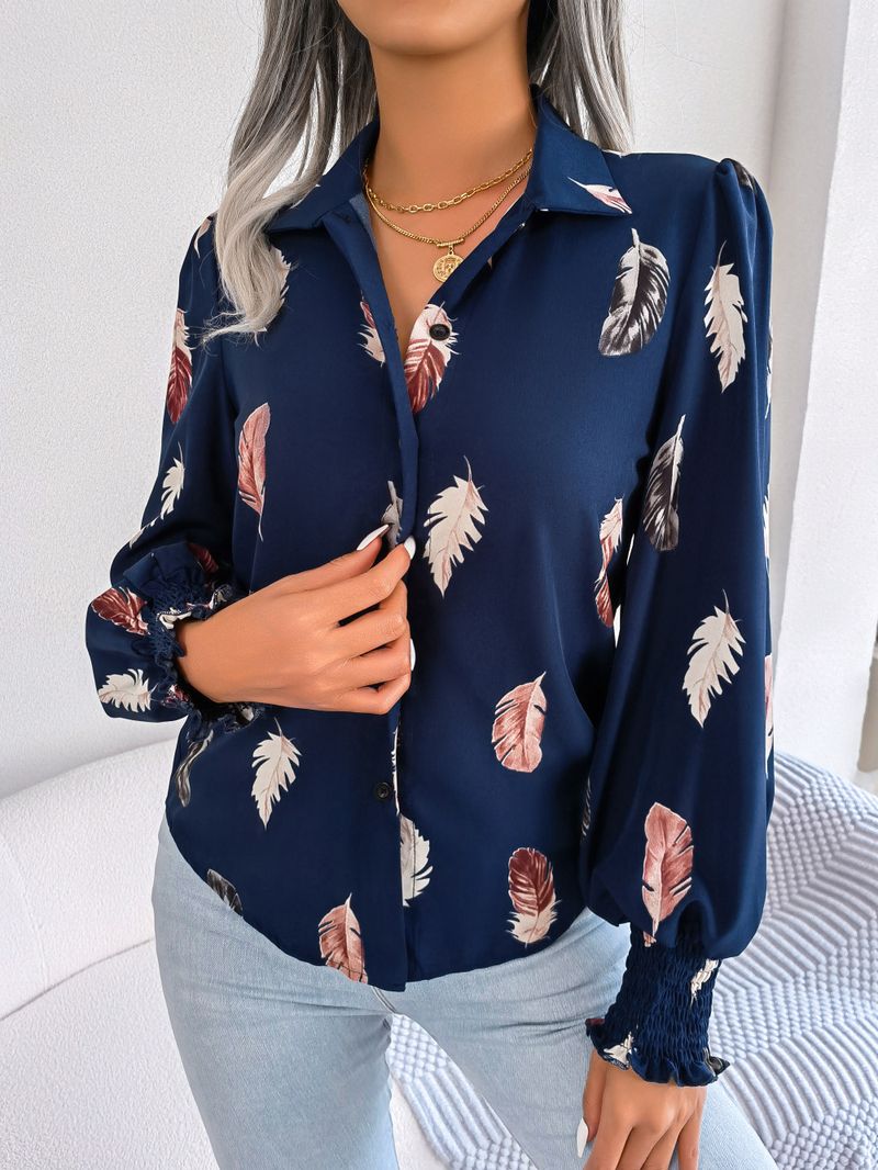 Abito da donna con camicia con risvolto e maniche a lanterna in piume di temperamento_voghion.com