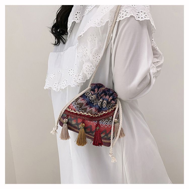 Borsa a secchiello da donna, stile etnico, borsa a tracolla con coulisse e nappa, borsa a secchiello da donna_voghion.com