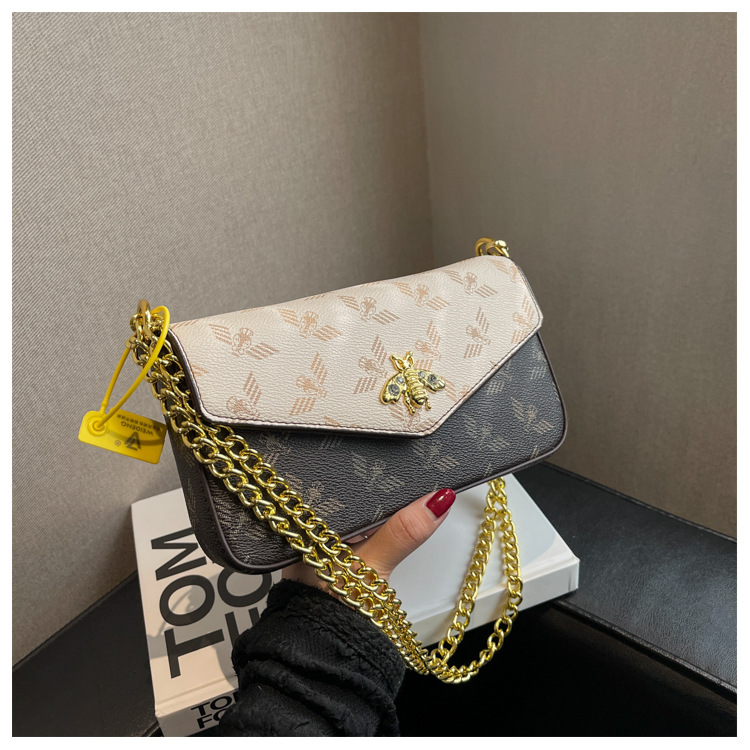 2023 nuova catena di moda singola spalla obliqua straddle piccola borsa versatile borsa a busta retrò piccola borsa quadrata marea_voghion.com