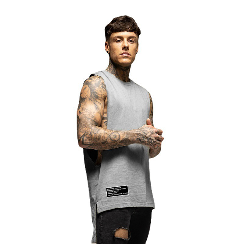 Canotta da allenamento estiva da uomo elastica con orlo lungo e fondo muscoloso in cotone, modello largo e alla moda_voghion.com
