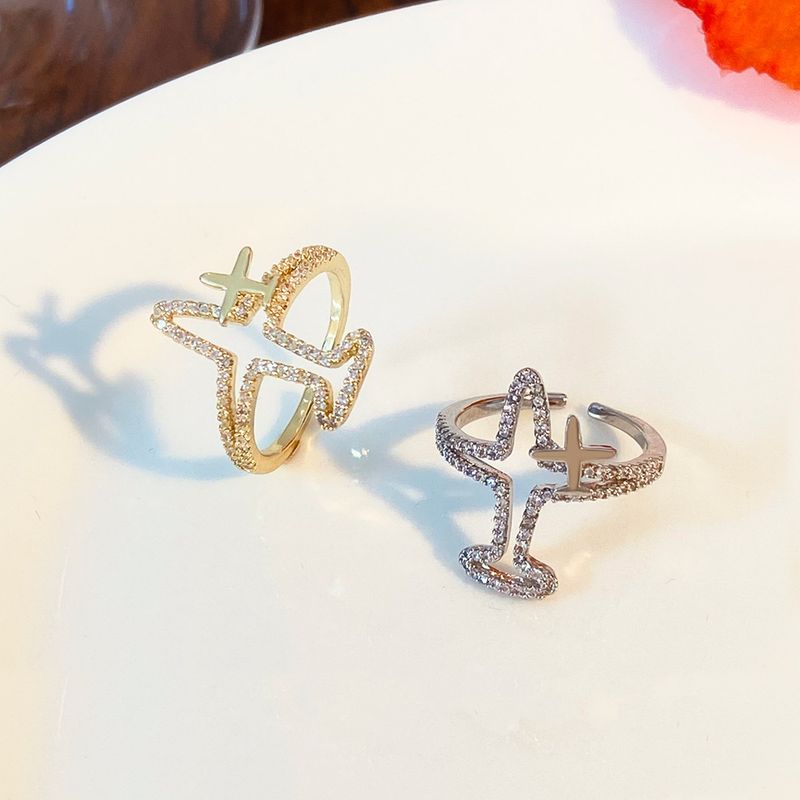 ins Volldiamant Hohlflugzeugring Damenmode Kreatives Temperament Nischenmetall Geometrischer offener Fingerring_voghion.com