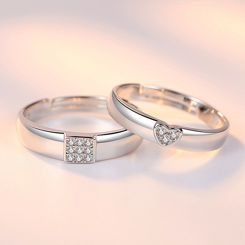 1 paio di anelli di coppia con cuore cavo e strass, per donna e uomo, alla moda, in argento, con zirconi lucidi, regolabili._voghion.com