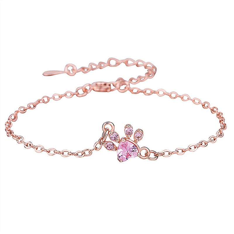Set di collana, orecchini, bracciale e anello con impronta a forma di cuore e zampa di gatto placcata in oro rosa_voghion.com