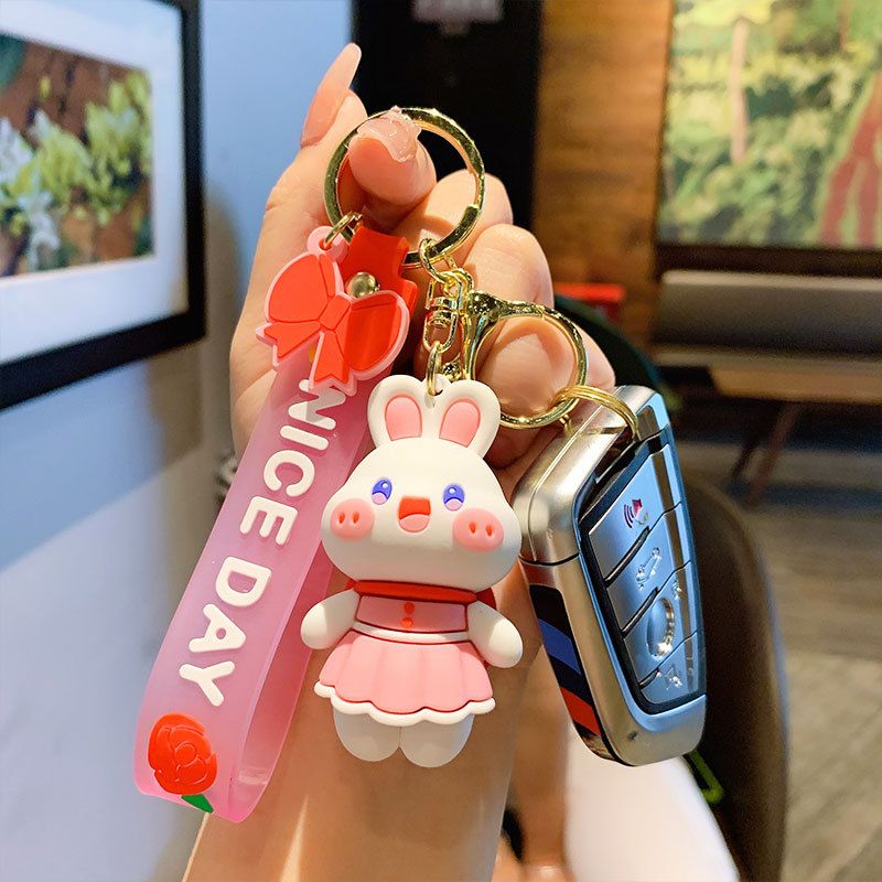 Portachiavi creativo e carino a forma di coniglietto con fiore, per donne, stile cartone animato, squisita coppia, decorazione per auto e zaino, piccolo regalo._voghion.com