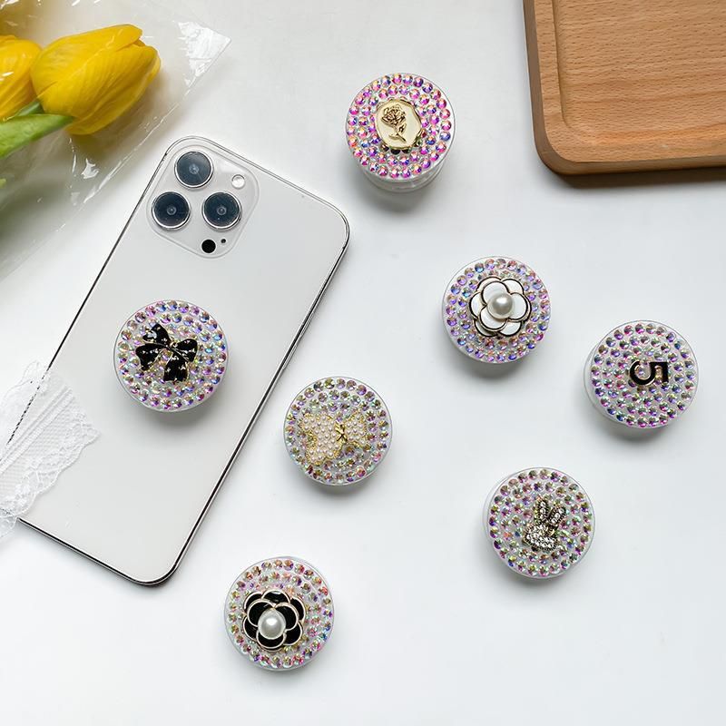 Han-Telefon-Airbag-Halterung, Wasserdiamant, Perlenberg-Teeblume, Ins-Windbogen, 5 stabile Desktop-Unterstützung, Nische_voghion.com