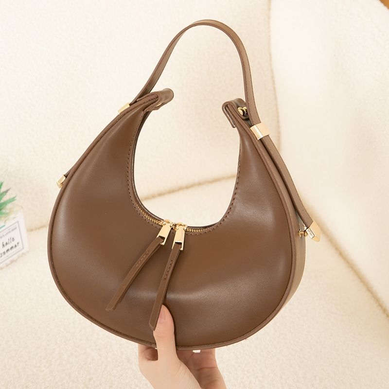 La nuova borsa di nicchia di quest'anno, borsa a mezzaluna a mezzaluna con spalla singola e ascellare di fascia alta da donna_voghion.com
