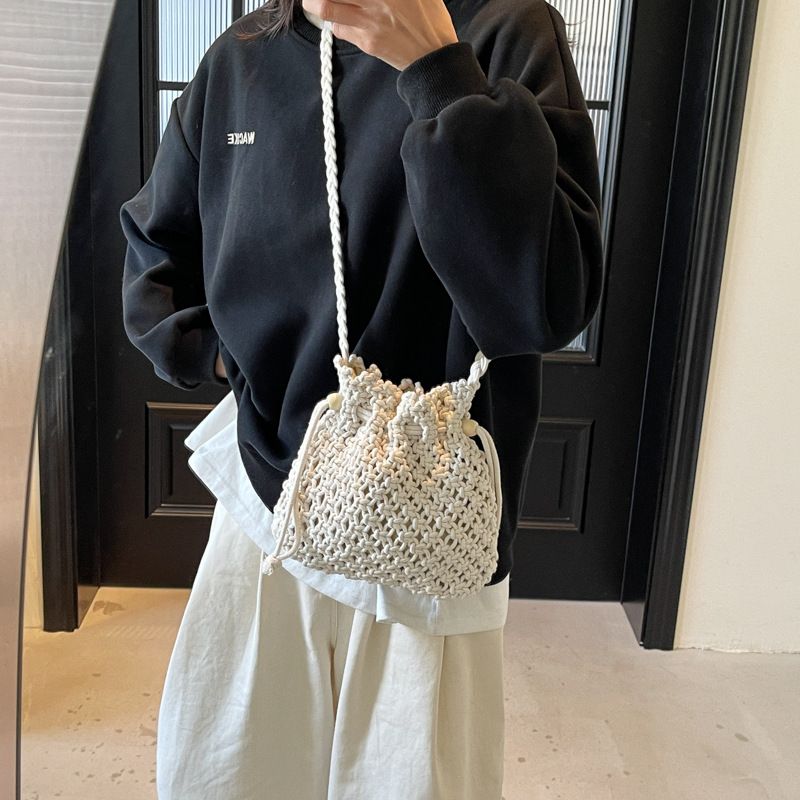Borsa a secchiello con tracolla in paglia intrecciata per donna, estate, versatile, 2025, nuova moda, design di nicchia_voghion.com