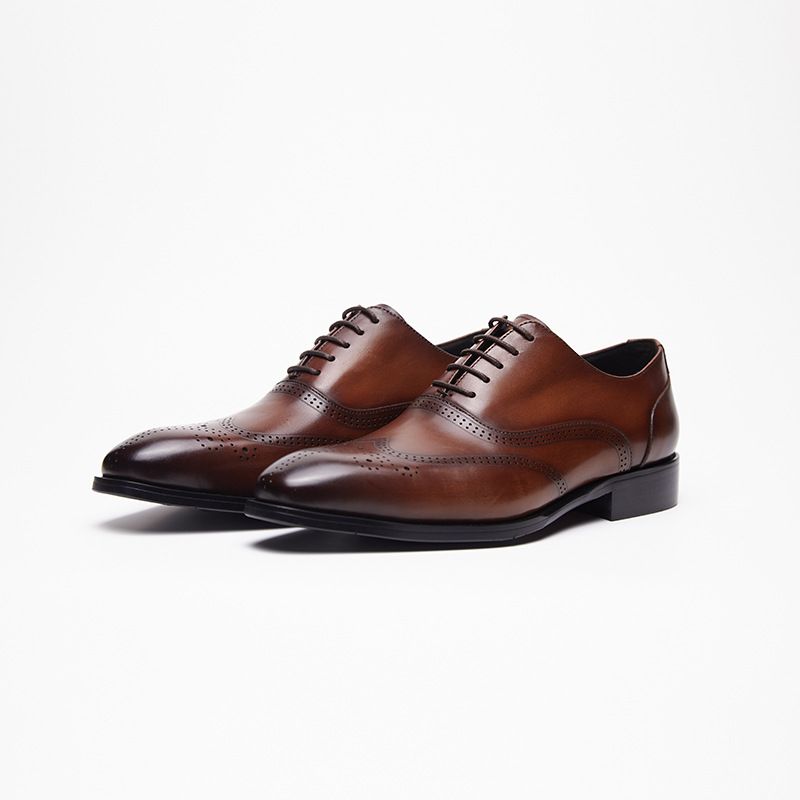 2025 Sommer Neue atmungsaktive geschnitzte Schnürschuhe Emed Hollow Business Casual Leder Loafer_voghion.com