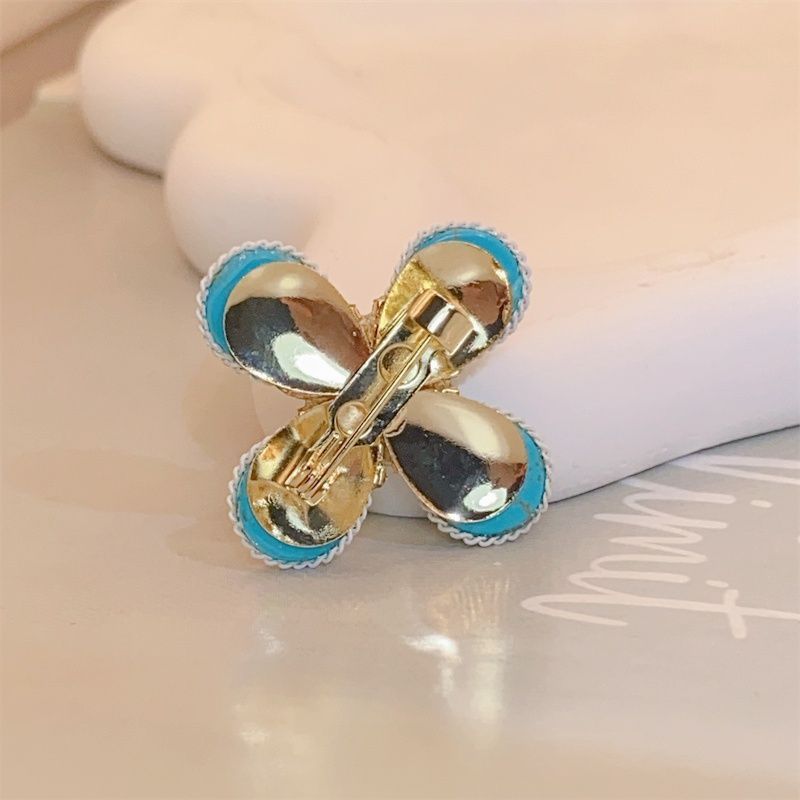 Spilla con perla turchese a quattro petali per donna, accessorio floreale vintage di alta gamma, di lusso e di nicchia_voghion.com