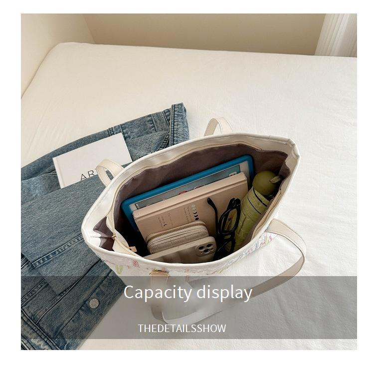 Stilvolle, gestreifte, bestickte Tragetasche für Damen – leichte Schultertasche aus Canvas mit abnehmbarem Anhänger, geräumiges Design für Arbeit, Uni und den täglichen Gebrauch_voghion.com