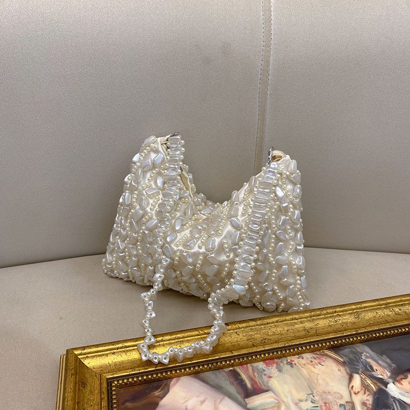 Borsa di lusso leggera con design a nicchia irregolare perlato sotto le ascelle, elegante e dal temperamento francese_voghion.com