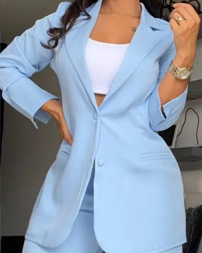 Completo da donna elegante con tasche e pantaloni dritti, a maniche corte e revers, tinta unita_voghion.com
