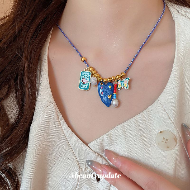 Braided Rope Freshwater Pearl Heart Pendant Necklace Fashion Versatile Collarbone Chain Niche Design Sense Jewelry For_voghion.com