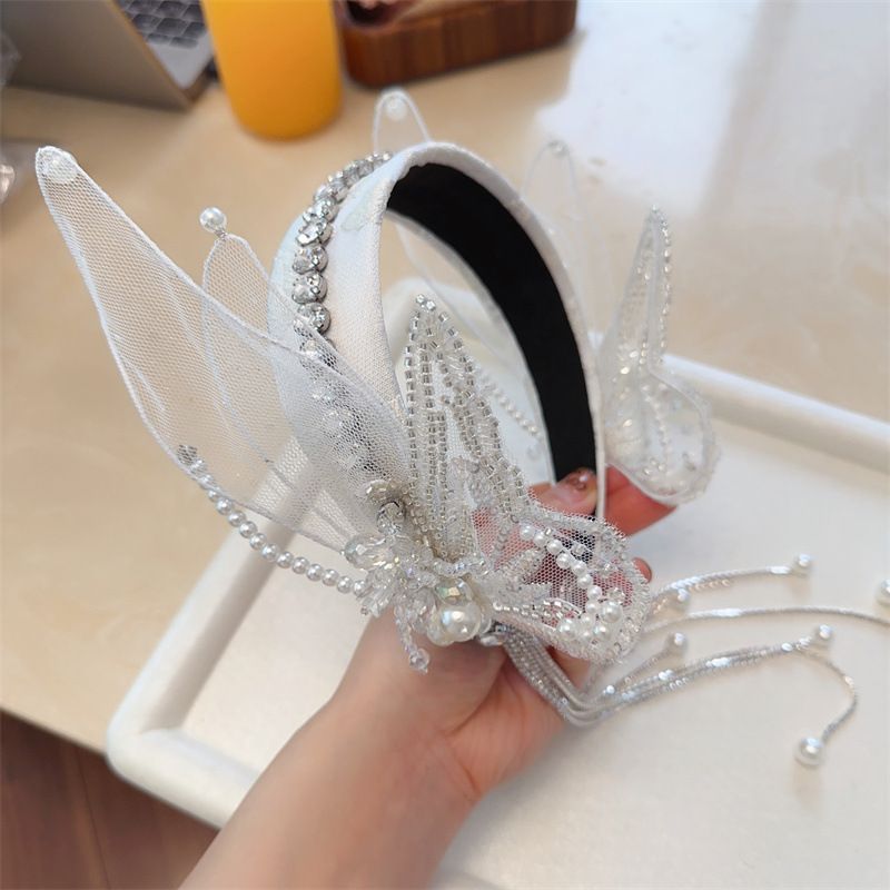 Fascia per capelli francese con ali di farfalla dolce, versione coreana, nuovo prodotto con nappa e forcina di strass, elegante fata_voghion.com