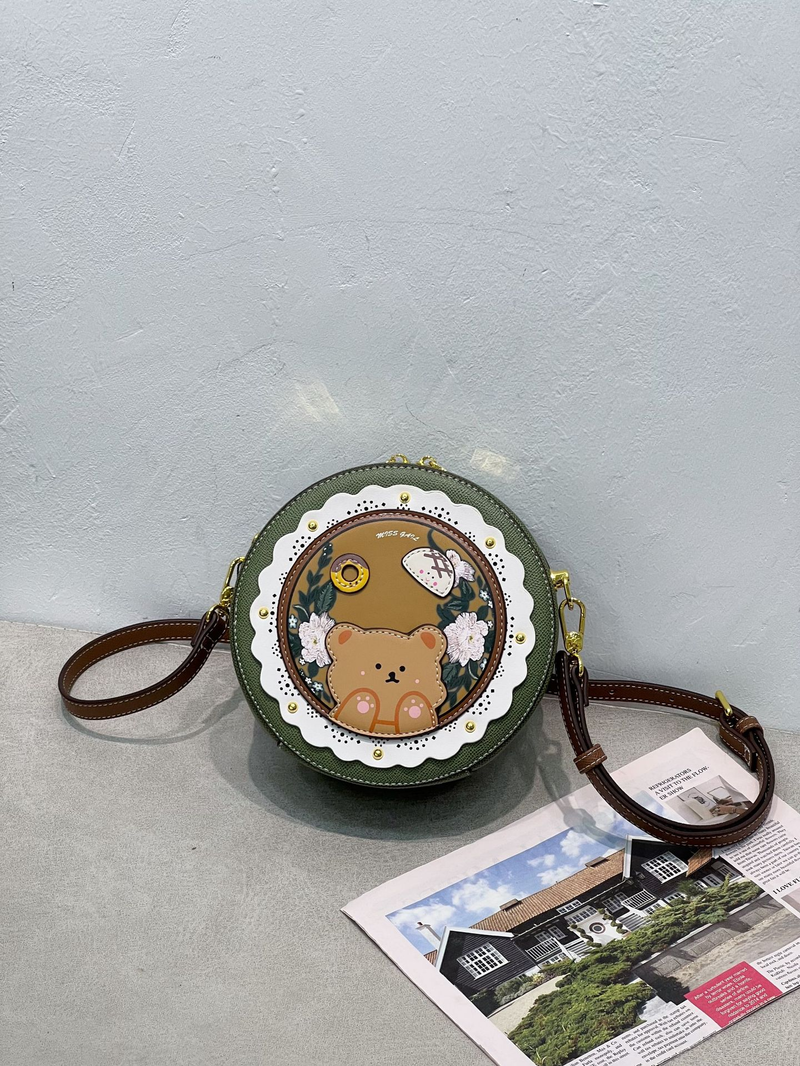 Borsa da donna, stampa vintage, borsa rotonda traforata, borsa a tracolla dal design di nicchia_voghion.com