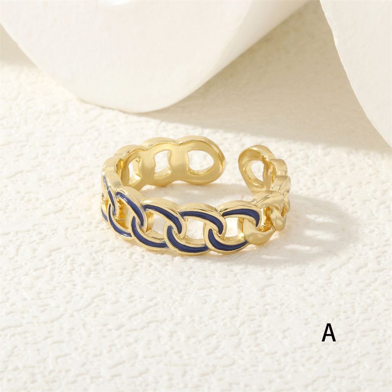 Exotischer offener Ring im Dopamin-Stil mit Hohldesign und kubanischem Kettenelement mit aufhellender Bonbonfarbe_voghion.com