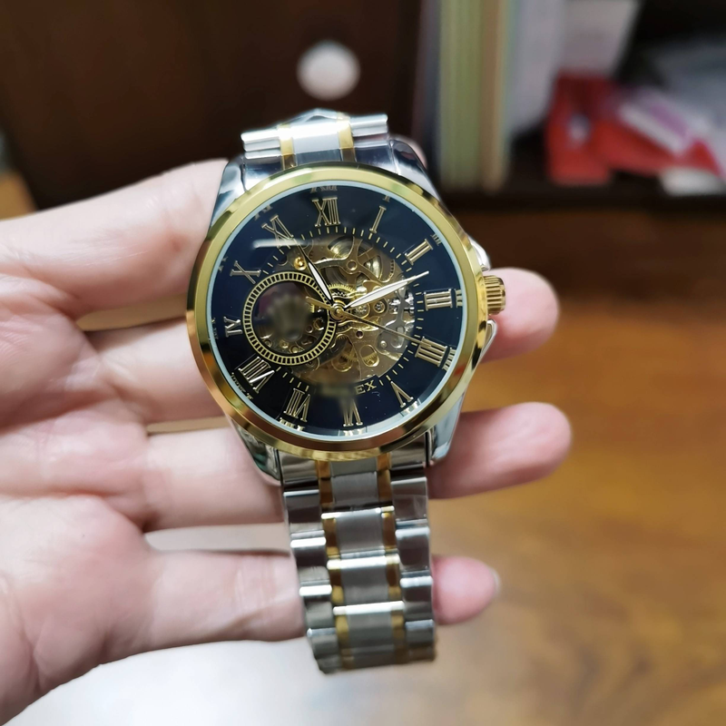 Augstas kvalitātes jauns, pilnībā automātisks, mehānisks, tērauda sloksnes pulkstenis ar vakuuma pārklājumu, vīriešu tērauda sloksnes dobs atpūtas pulkstenis_voghion.com