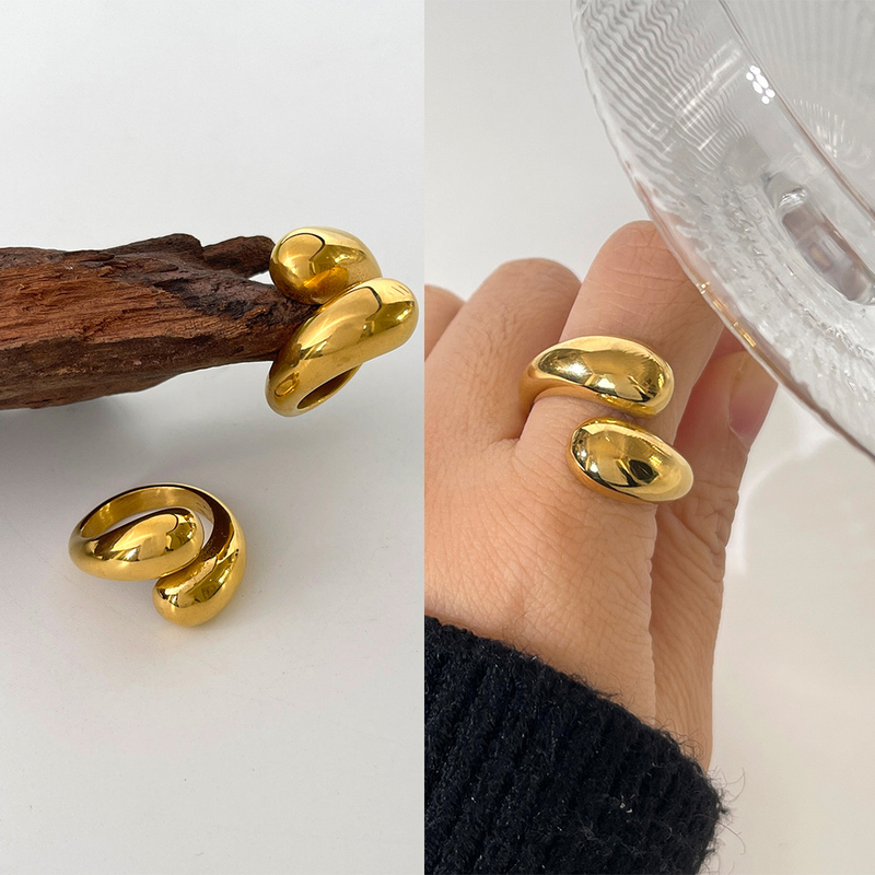 Kleine Gruppe Kaltwind-Titanstahl-Wassertropfen-Kreuz-glänzender Ring übertriebener unregelmäßiger Ring_voghion.com
