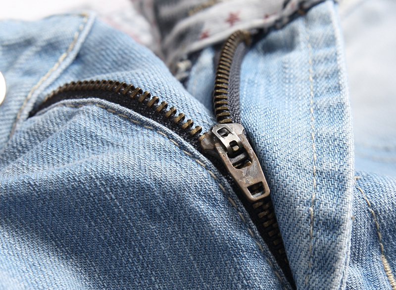 Pantalones juveniles de algodón azul, de cintura media, sin elásticos, lavados a mano, desgastados, con cremallera frontal abierta y largo medio._voghion.com