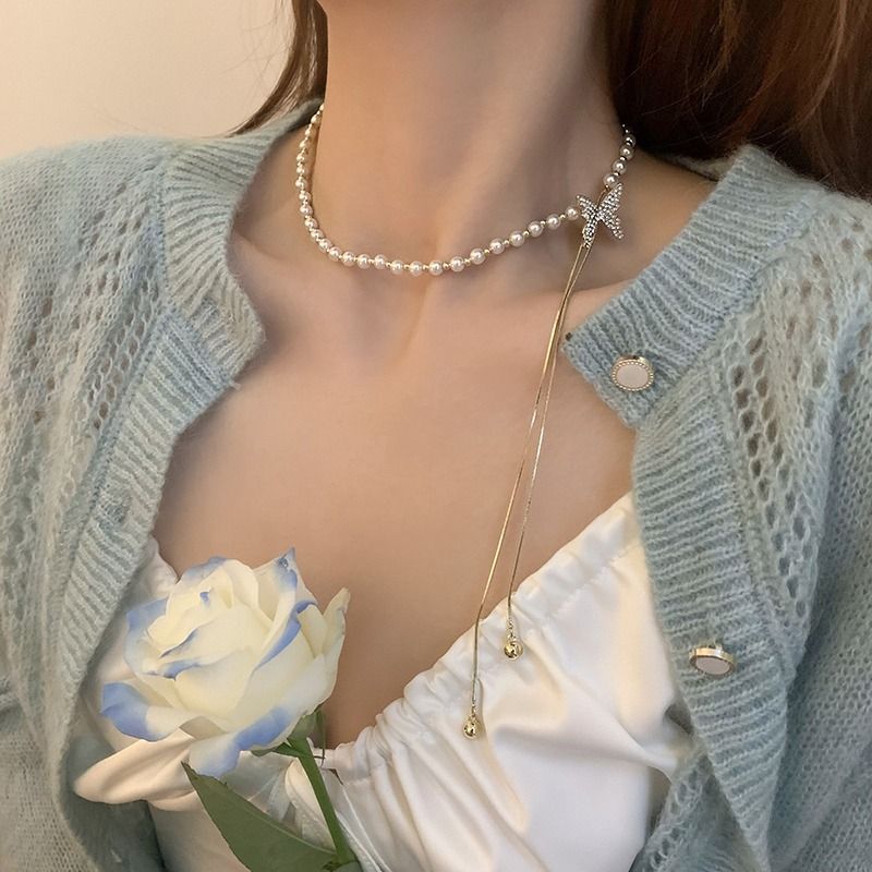 Pearl necklace for women, necklace design, niche butterfly tassel pendant, clavicle chain 2023 new_voghion.com