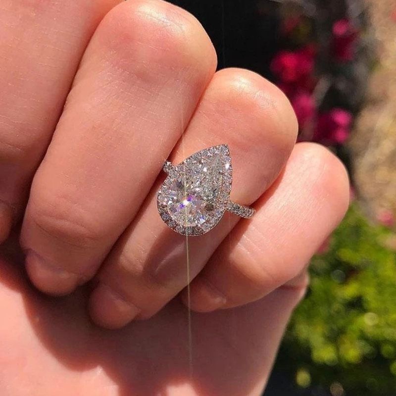 Cao Shi Creative - Anello nuziale da donna con zirconi a forma di goccia d'acqua scintillante_voghion.com