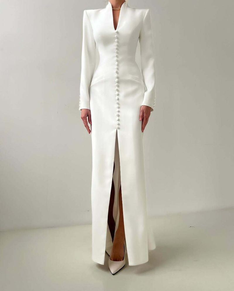 Vestido de mujer con hombreras y falda decorativa, cuello en V, cintura alta y ajustado._voghion.com
