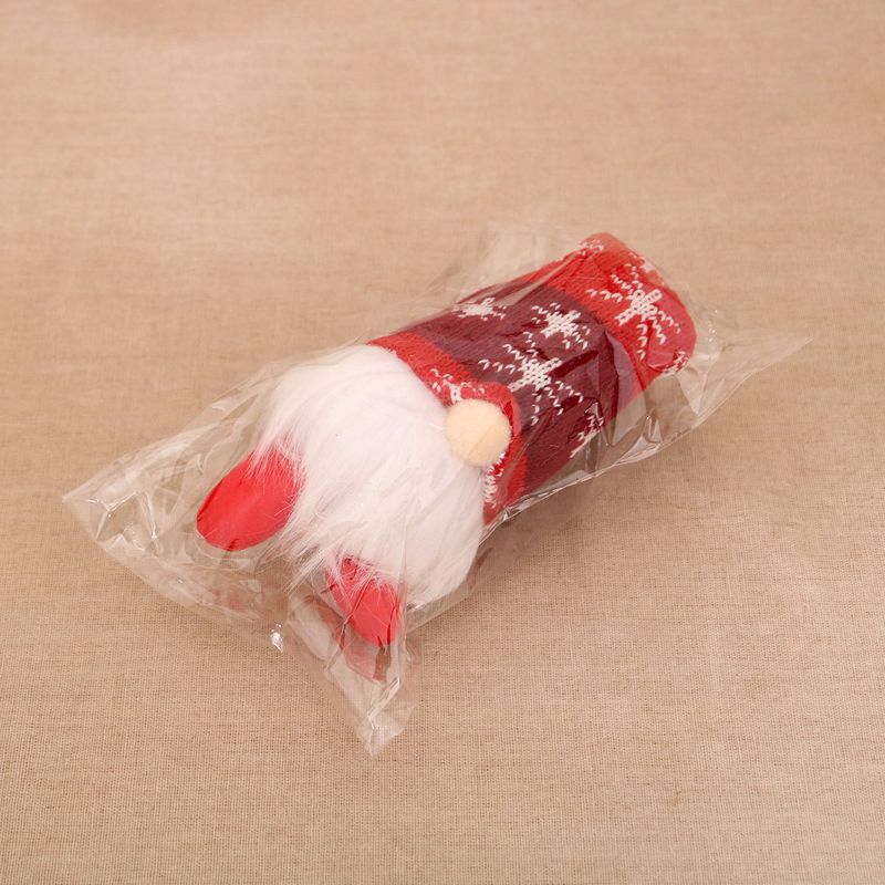 Adorno navideño de peluche con forma de estrella y copo de nieve a rayas LED, color rojo, verde y gris, sentado y con patas largas._voghion.com
