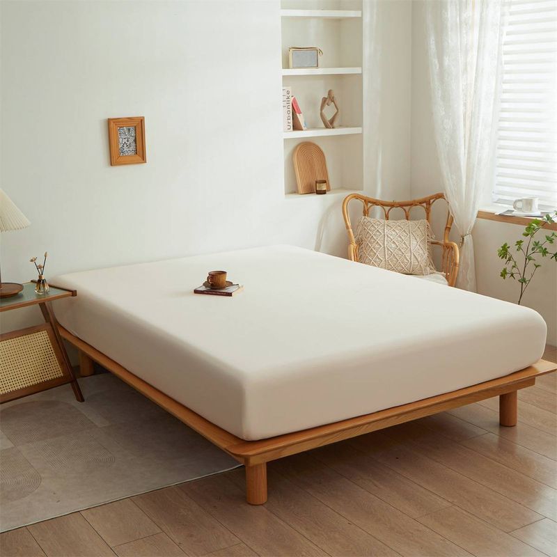 Drap-housse uni – Protège-matelas extensible et antidérapant (blanc, rose, bleu ciel et plus) – Couvre-lit minimaliste moderne_voghion.com