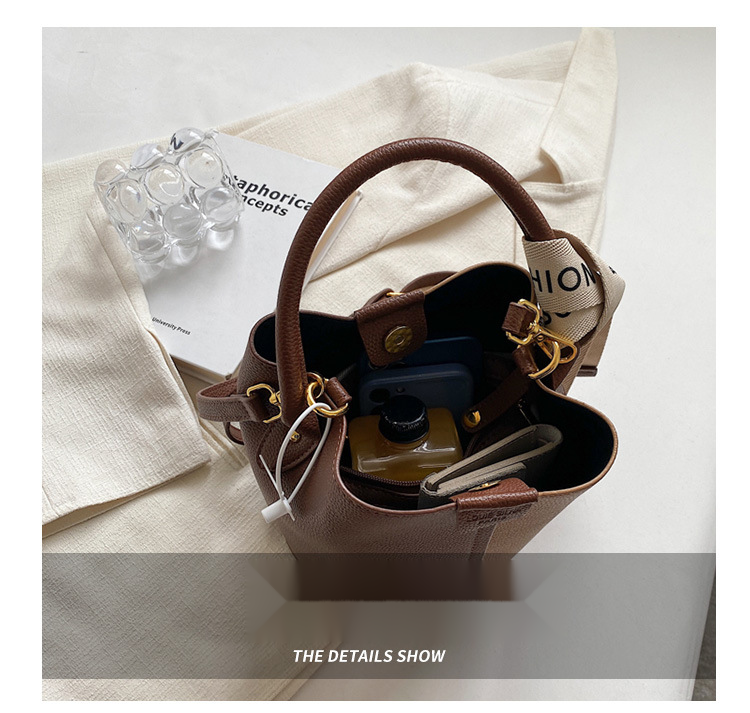 New portable bucket bag with niche design, women's color blocked crossbody bag with high aesthetic value, underarm shoulder bag_voghion.com