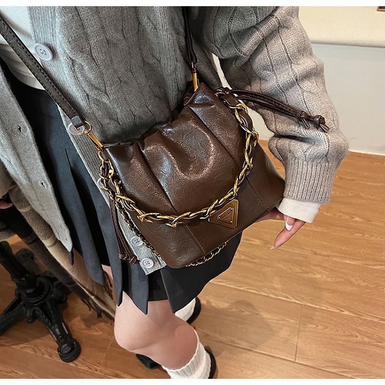 Soft leather pleated bucket bag, women's light luxury bags with a stylish and niche high-end texture, chain shoulder_voghion.com