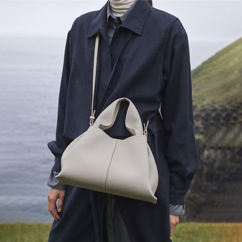 Top Layer Cowhide Dumpling Bag French Niche Single Shoulder Crossbody Bag Handbag Female Niche Simple Cloud Bag_voghion.com