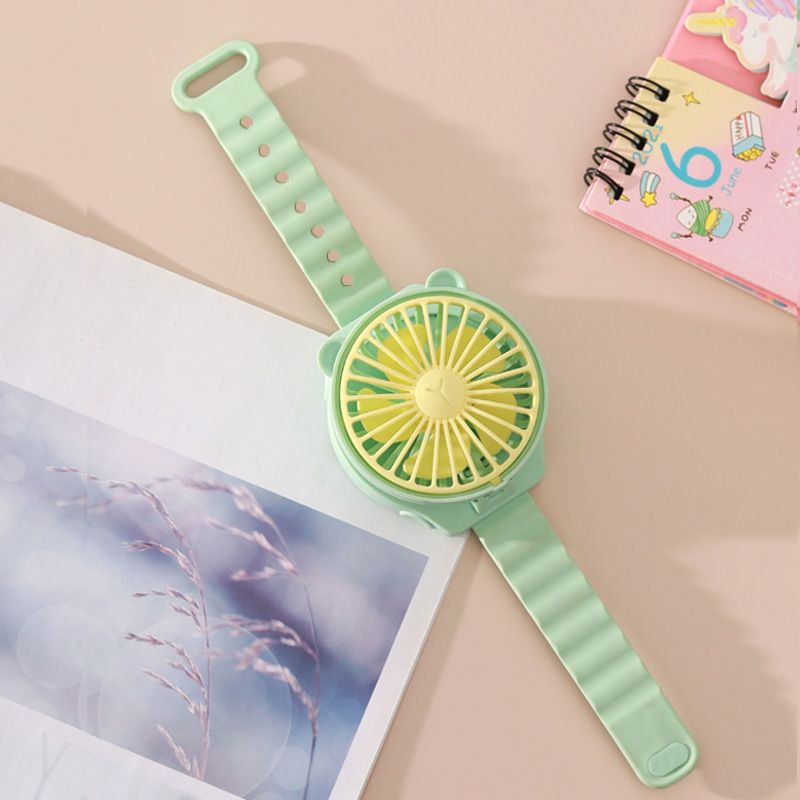 Orologio da polso per bambini in stile celebrità di Internet, mini ventilatore tascabile portatile da esterno con batteria a secco_voghion.com