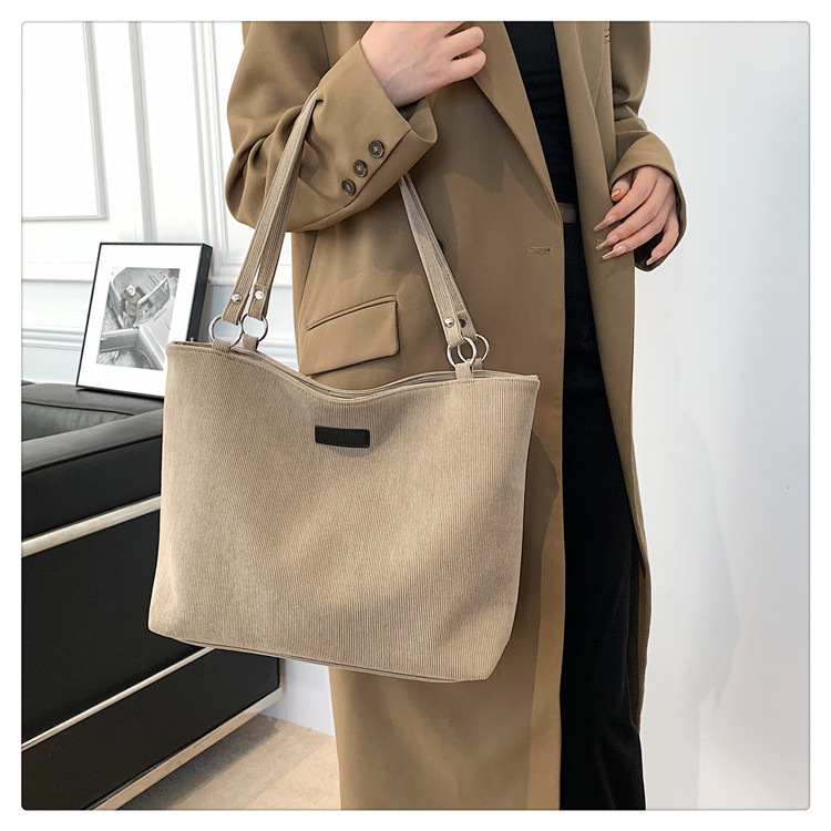 Canvas multifunctional bag women's simple and versatile commuter shoulder bag large capacity fashion tote bag_voghion.com
