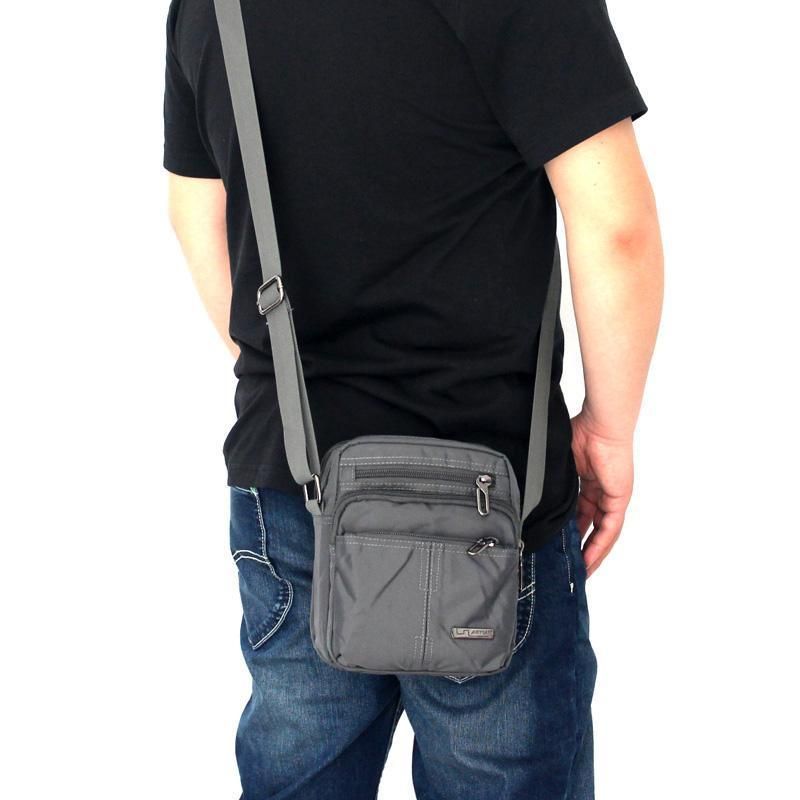 2025 Spring And Summer New Trend Men's Mini Bag Waterproof Nylon Oxford Canvas Shoulder Crossbody Casual Backpack Versatile_voghion.com