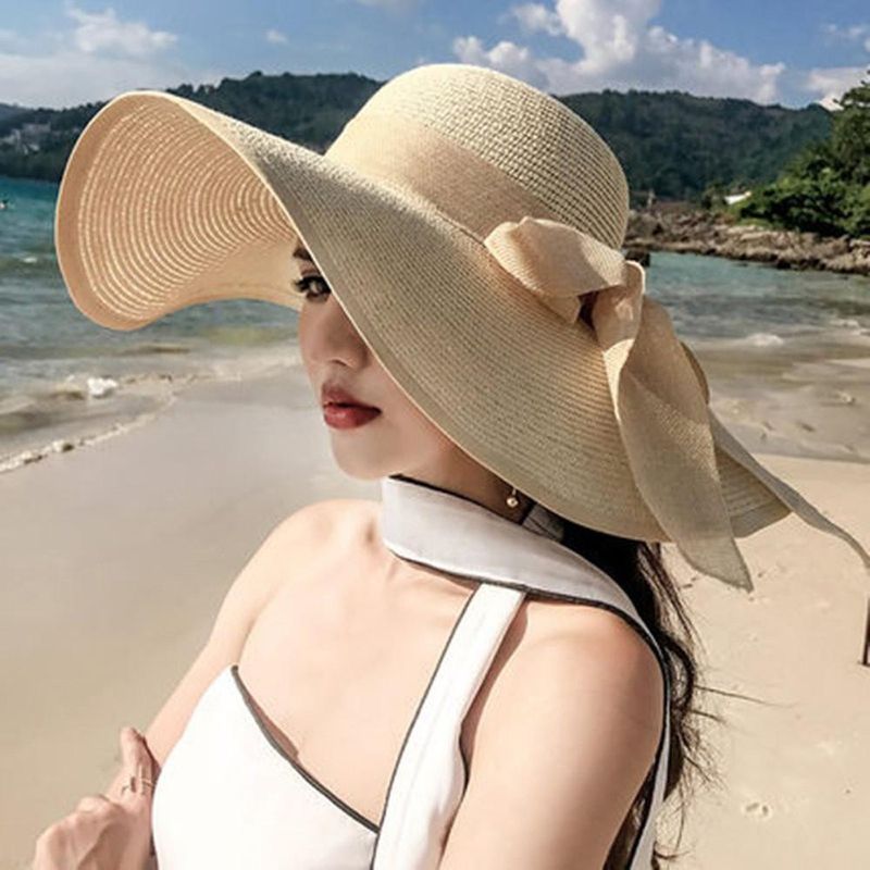 Vendita calda all'aperto Donna alla moda da mare Grande fiocco a tesa larga Protezione solare Cappello di paglia pieghevole_voghion.com