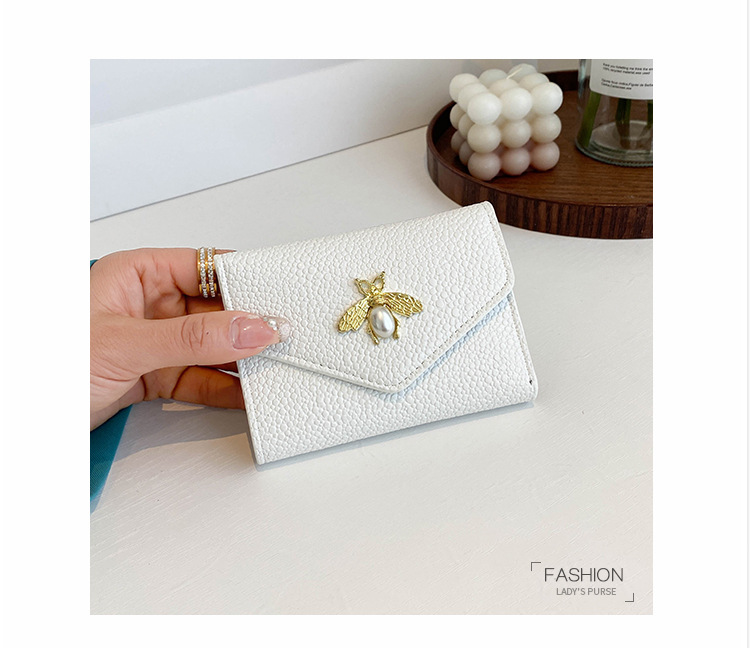 Cross-border small bee wallet female 2023 new short section small and thin section wallet 30% off niche solid color coin purse PU_voghion.com
