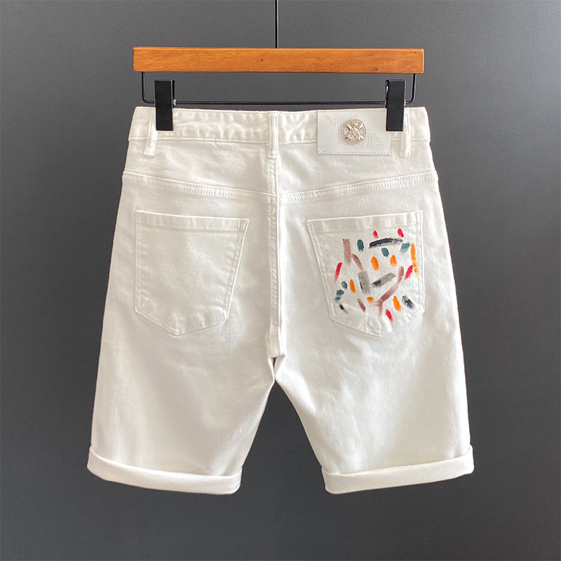 Hochwertige europäische Luxus-Jeansshorts in Weiß, Slim Fit-Modelabel für Herren, vielseitiger elastischer Graffiti-Druck, modisch_voghion.com