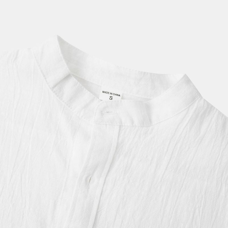 Camicia da uomo ampia a maniche lunghe in cardigan con colletto alla coreana in lino tinta unita_voghion.com