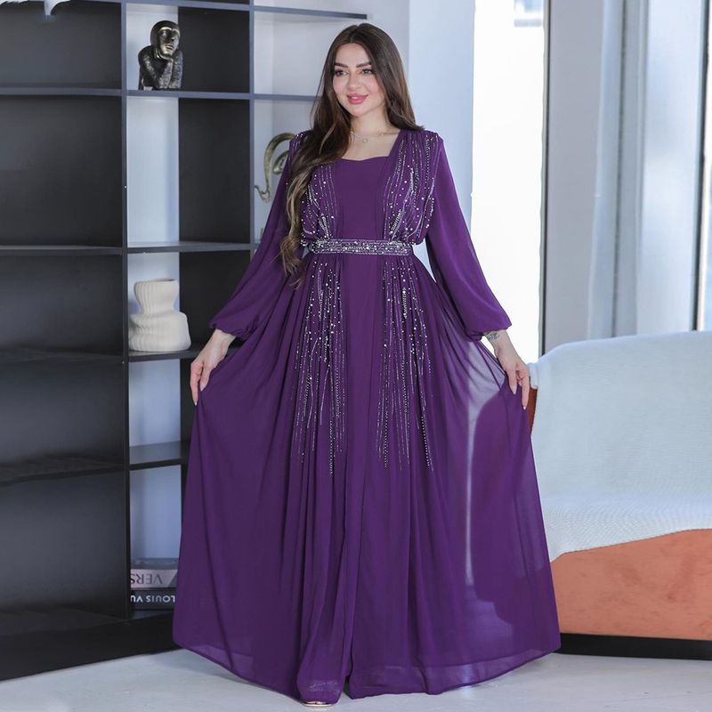 Abito da sera con cintura e gonna lunga da donna_voghion.com