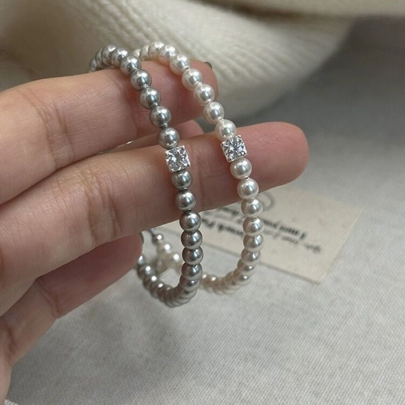 Liten utsøkt zirkon sukkerbit Shijia perle elastisk armbånd lys luksus fransk elegant armbånd jenter smykker engros_voghion.com
