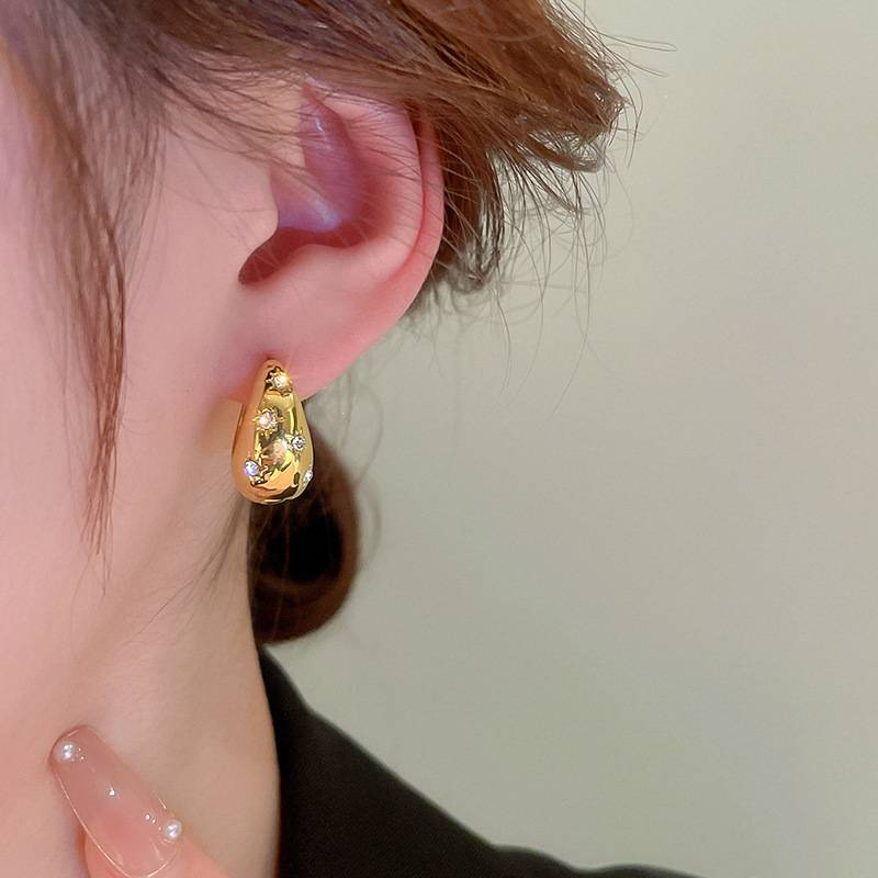 Pendientes de nueva tendencia con diseño de nicho simple, pendientes circulares de estrella, pendientes de metal retro de alta gama franceses._voghion.com