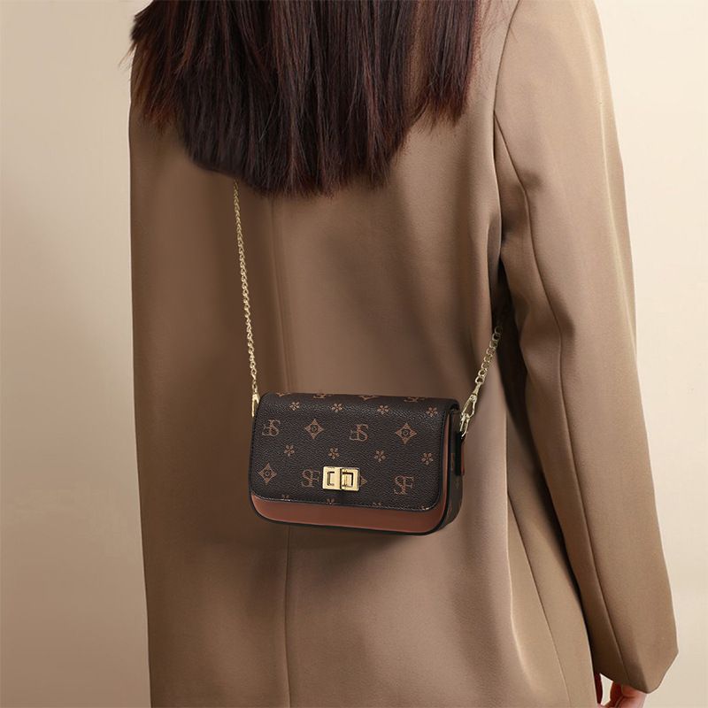 FOXER/ Borsa a tracolla vintage da donna con stampa Golden Fox e catena per telefono_voghion.com