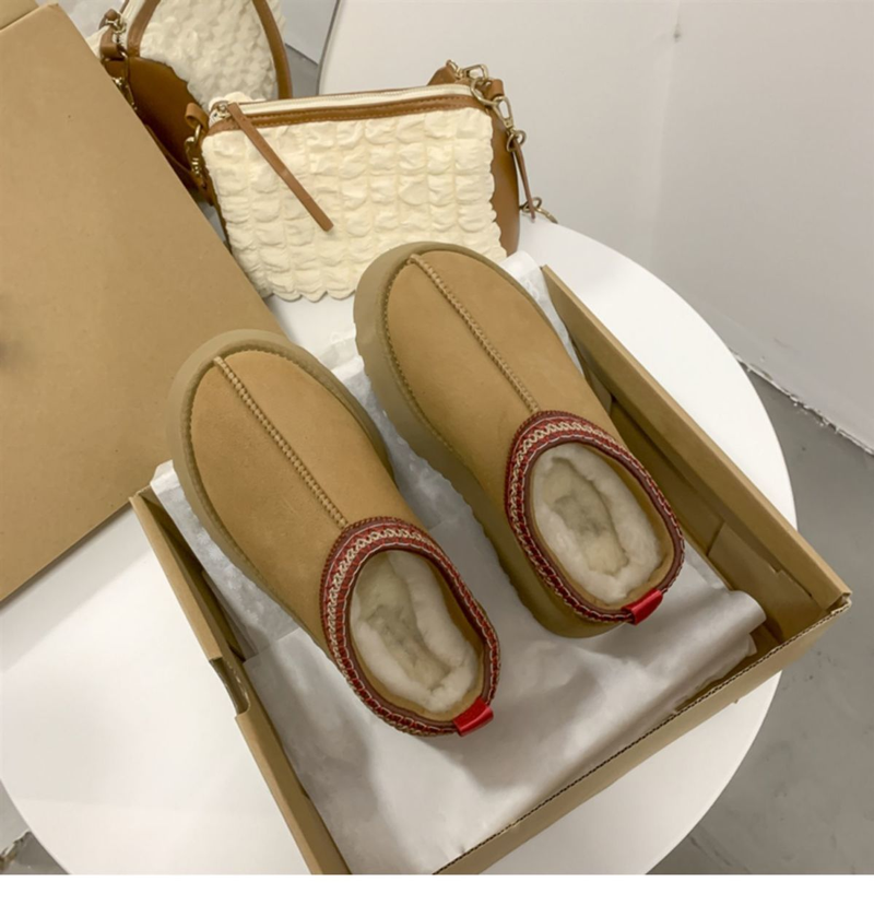 2023 otoño e invierno nuevo estilo botas de nieve ropa de abrigo para mujer zapatos de lana de suela gruesa con piel integrada Baotou medias zapatillas más forro polar_voghion.com
