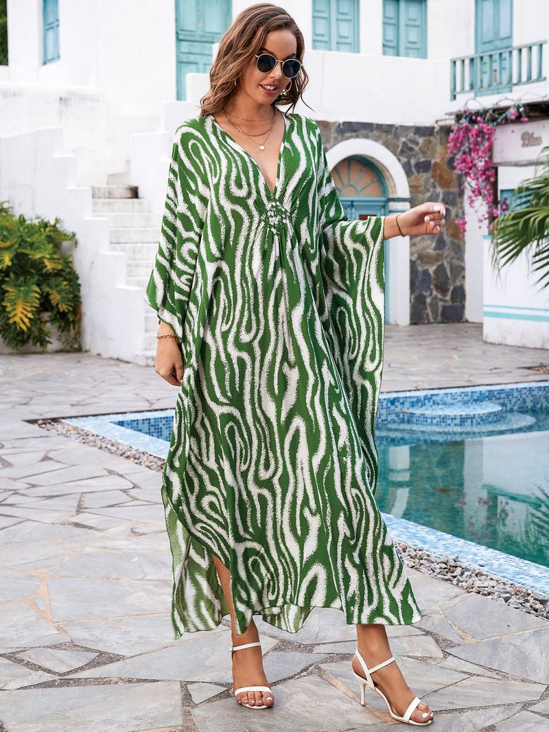 „Strandkleid mit Bohemian-Print – Fließendes langes Kleid für Pool und Urlaub“_voghion.com