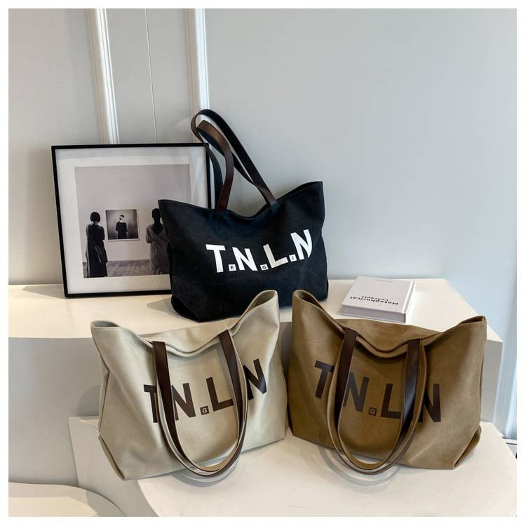Bolsa de lona de grande capacidade feminina nova cor sólida bolsa de ombro casual versátil sacola estudante universitário classe sacos de deslocamento_voghion.com