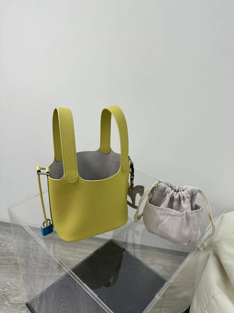 Borsa a cestino in vera pelle da donna, borsa a secchiello dal design di nicchia di alta gamma, mini borsa a mano in pelle di mucca TOGO con primo strato per l'estate_voghion.com