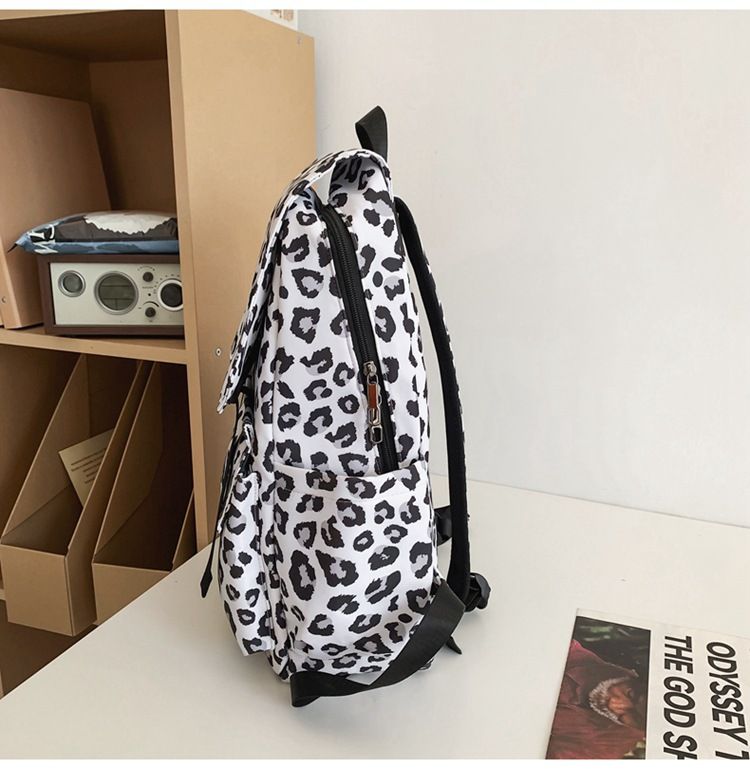 Fashionable large capacity high aesthetic value backpack with waterproof and versatile casual flip design, original_voghion.com