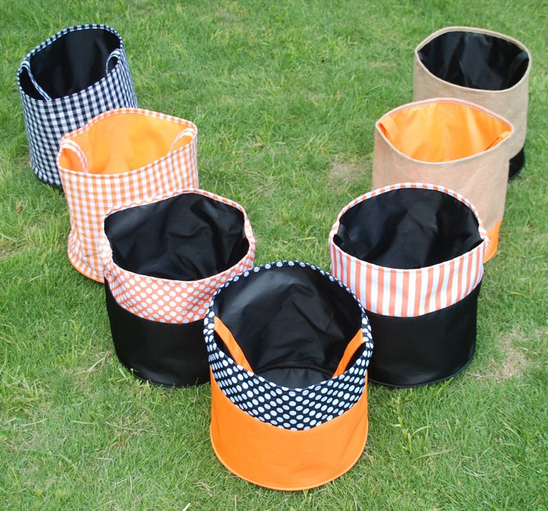 New Halloween candy bag black and white plier cloth hand basket candy storage bucket holiday decoration gift bucket_voghion.com