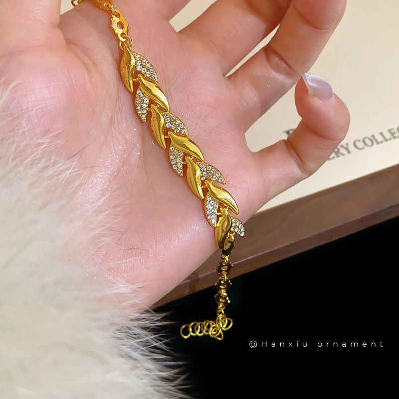 Braccialetto versatile con foglia di grano in oro e diamanti intarsiati, design di nicchia, leggero, lussuoso, di alta qualità, per donna_voghion.com